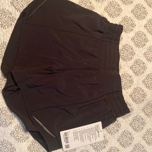 Lululemon black 4” Hotty Hot black short NWT